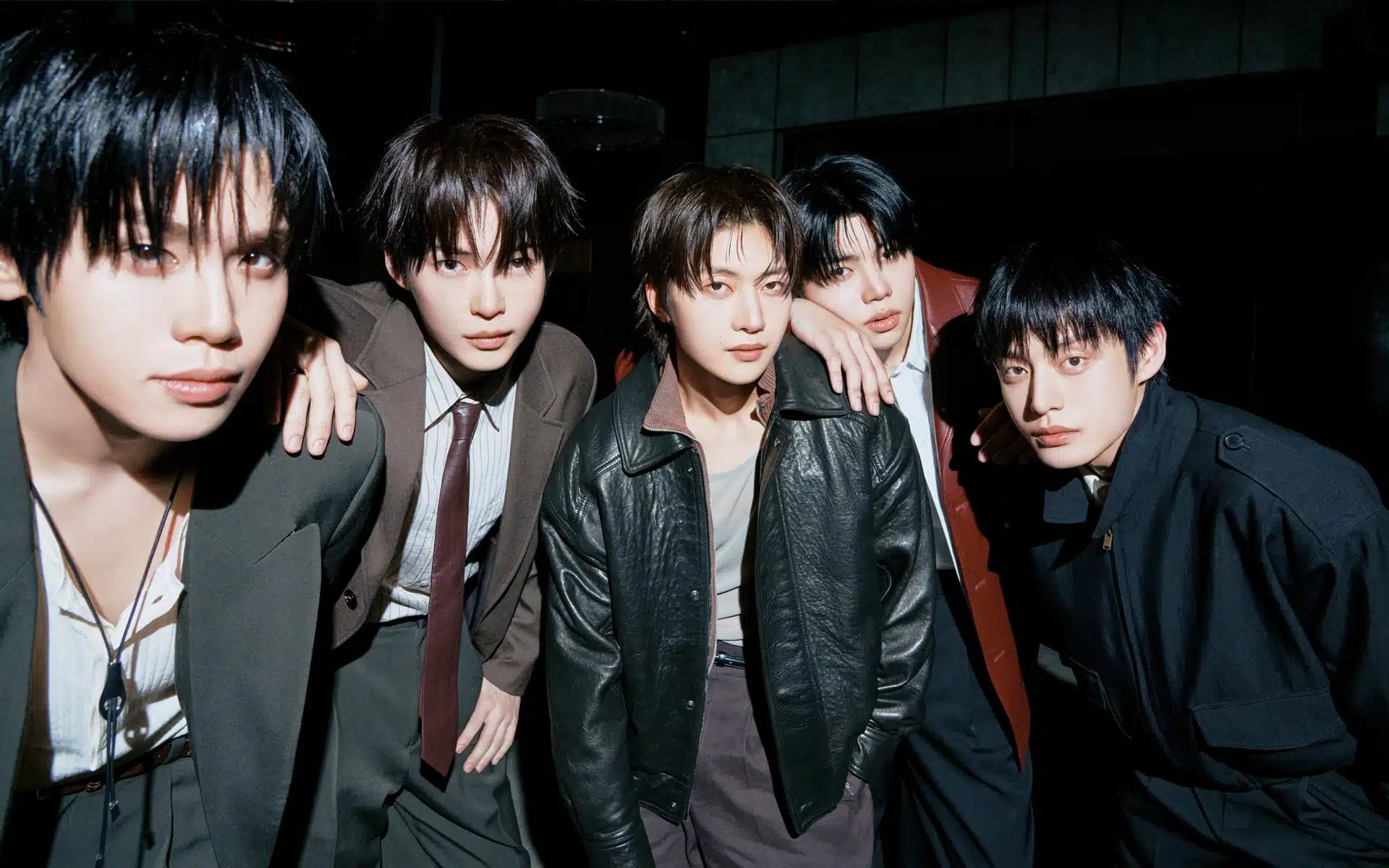 The five members of ZEROBASEONE in a dark-mood group concept photo for the 〈Ascend-〉 comeback