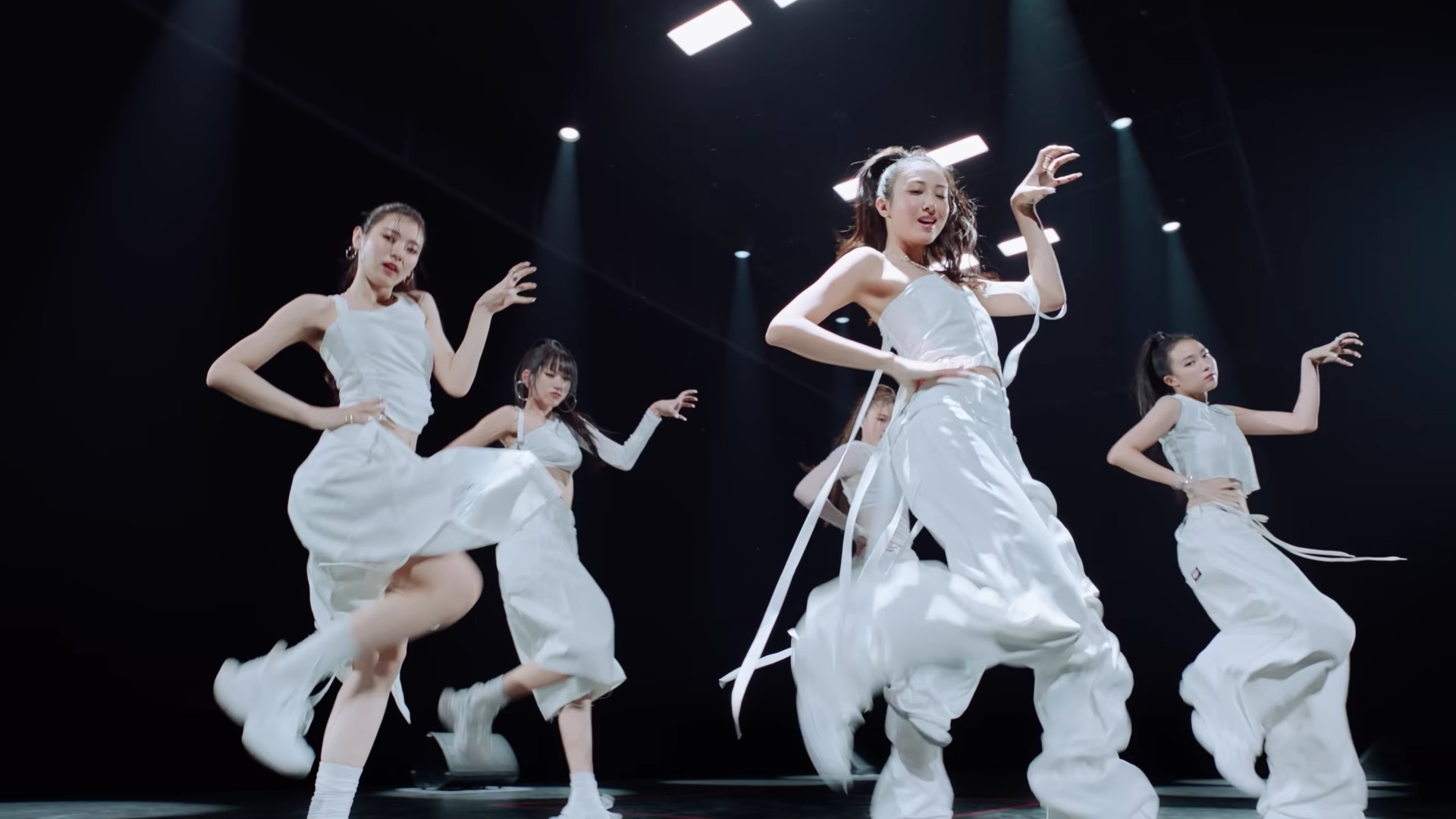 MEOVV performing their signature cat-claw choreography