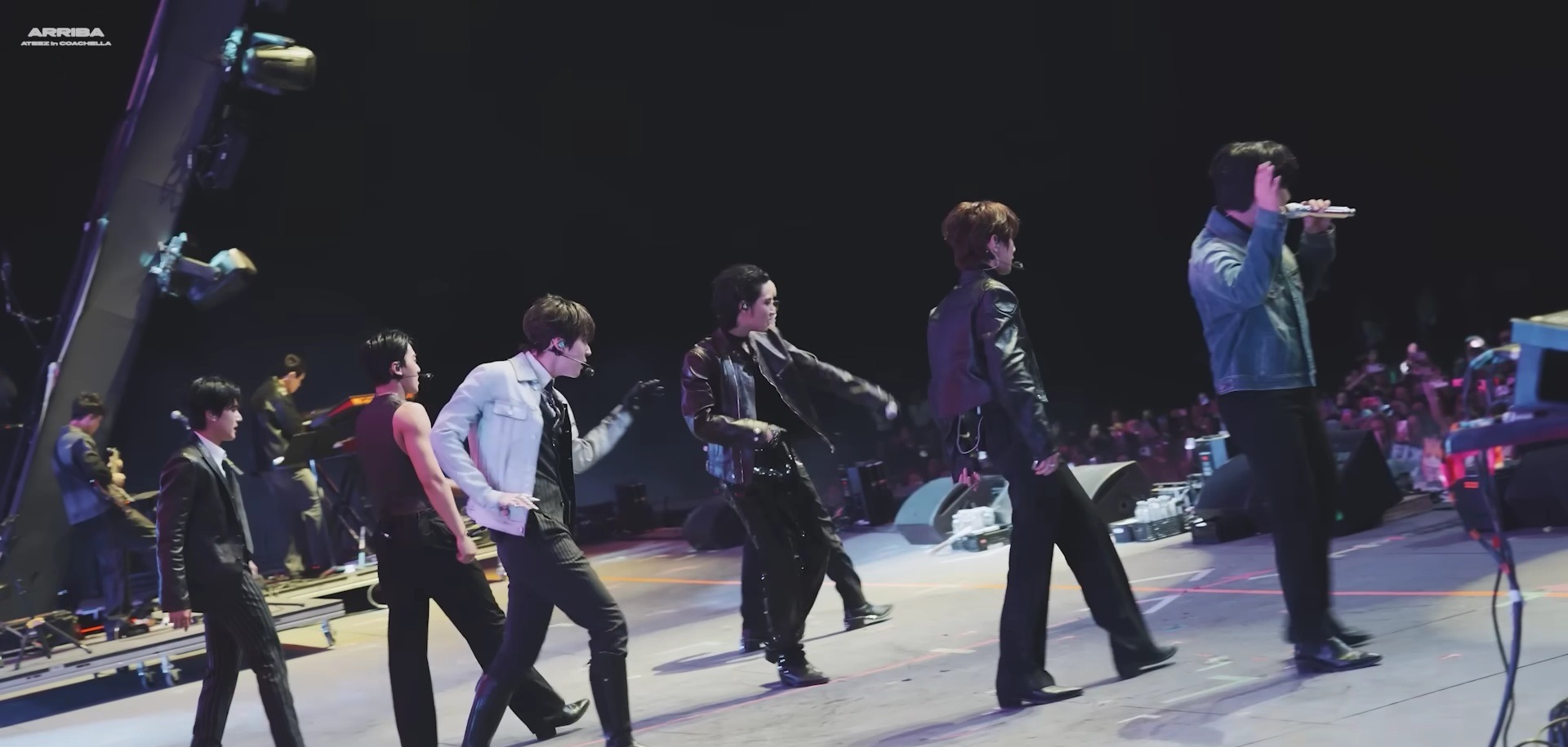 ATEEZ performing with a live band on the Coachella stage in 2024