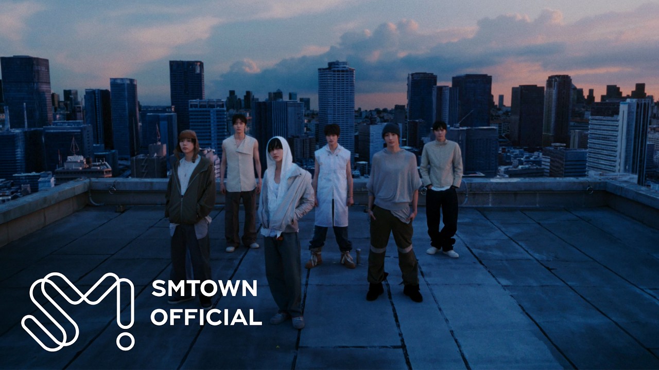 RIIZE standing on a rooftop at dusk with a city skyline in the II album trailer