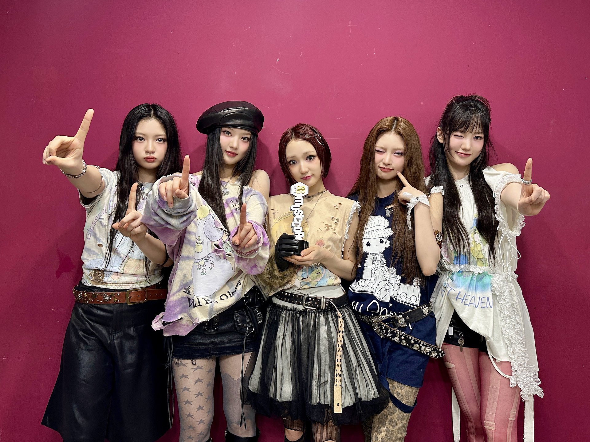 KiiiKiii on the day they received their first music show trophy for debut track I DO ME